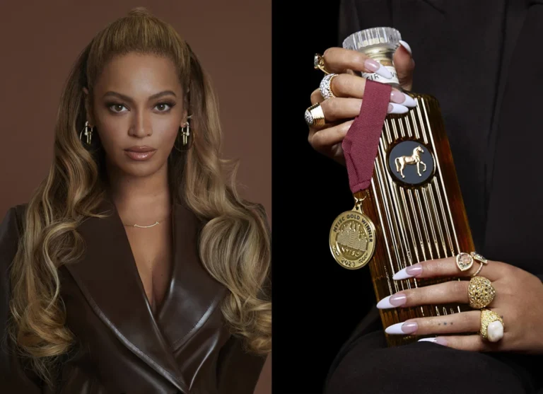 Split image promoting the SirDavis whisky launch. On the left, Beyoncé poses, wearing a brown leather jacket with long, wavy blonde hair. On the right, a hand (presumably Beyoncé's) holds the gold-toned SirDavis whisky bottle, which features a bronze horse logo and a gold "Best Gold Winner" medal on a burgundy ribbon.